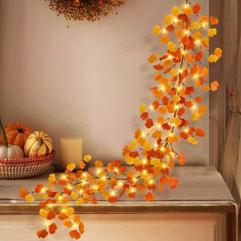 PRICES MAY VARY. Details Crafted: With a length of 6FT(72”/1.8M), crafted with realistic veining and detail on ginkgo leaves, our fall leaves garland features vibrant fall color and lifelike look, stunning and well-made 8 Lighting Modes : Press the black soft control button to switch between the lighting models. Various lighting effects create different fall atmospheres Battery operate &Timer: 3 AA battery required.The fall lighted garland can light up for 6 hours and automatically turn off for November Decor, Fall Leaves Garland, Foliage Garland, Garland With Lights, Lighted Garland, Thanksgiving Wall Decor, Mantel Fireplace, Leaves Garland, Fall Leaf Garland