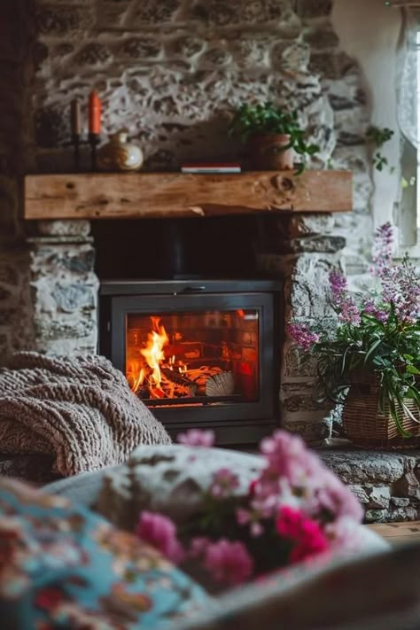 Cozy Cottage Fireplace Ideas for Your Home Retreat Small Cabin Fireplace, Cottage Bedroom With Fireplace, European Cottage Fireplace, Cottagecore Fireplace, English Cottage Fireplace, Cottage Fireplace Ideas, Cozy Cottage Aesthetic, Fireplace Cottage, Texas Cottage