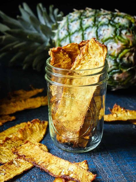 Close up of pineapple jerky in a glass mason jar on a blue wooden table. Dehydrated Pineapple, Dehydrate Pineapple, Dehydrated Recipes, Duck Breast Recipe, Blackberry Sauce, Chai Masala, Spicy Pineapple, Homemade Jerky, Jerky Recipe