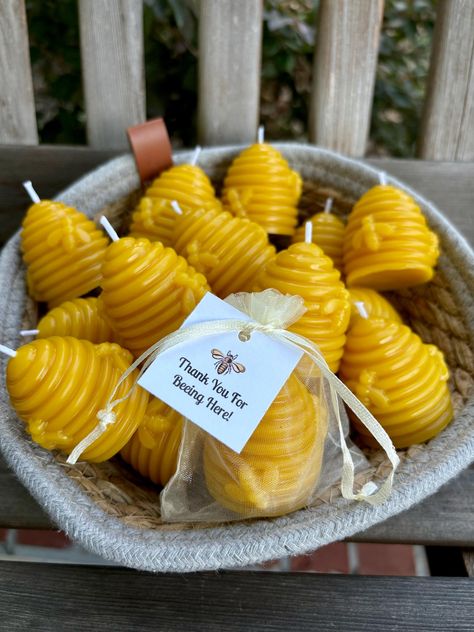 Perfect personalized party favors for your next bumble bee, honey bee or Oh, Honey-themed event. Lovely beehive candles are made of all natural beeswax. Candles are approx 1.5in by 2in tall. Beehive candles are unscented, but do have a warm, from the hive honey scent.  Each candle is packaged in an ivory organza bag with square, cardstock tag attached.  These favors are ready for your next baby/bridal shower, birthday party, office event and so much more! All items ship quickly.  We love our family owned Apiary and the bees constantly amaze us! Honey Themed Party Favors, Honey Bee Tea Party, Bees Birthday Party Ideas, Honey Birthday Party, Honey Themed Baby Shower Ideas, Sweet As Can Bee Baby Shower Ideas, Bee Centerpiece Ideas, Bee Wedding Theme, Baybee Shower