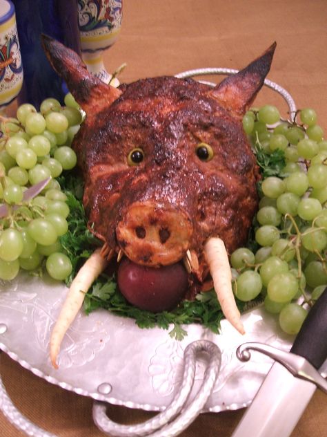 "Boar's Head" Meatloaf  100% beef mixed with onion, glazed with a mix of ketchup, mustard, and soy sauce. The ears and nose are roasted potatoes, the teeth pumpkin seeds, the tusks are parsley root, the eyes are blueberries and olives. Halloween Meatloaf Ideas, Bake A Ham, Parsley Root, Spooky Dinner, Halloween Themed Food, Halloween Food Appetizers, Halloween Menu, Cheap Halloween Decorations, Spooky Food