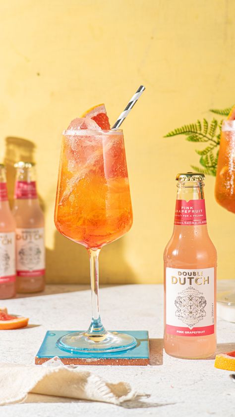 We love this sunset Aperol spritz recipe. Made with Aperol, Prosecco and Double Dutch Grapefruit Soda, this is the perfect summertime cocktail!  Recipe below:  1. Fill your glass with ice.🧊 2. Pour your Prosecco and Aperol over ice. 🍹 3. Top with Double Dutch Pink Grapefruit Soda. ☀️💞 4. Stir gently and garnish with a half moon of grapefruit and a sprig of thyme. 💫 5. Enjoy & Cheers! 💞  #aperolspritz #summercocktails #cocktailrecipes #cocktailrecipe Aperol Spritz Recipe, Summertime Cocktail, Spritz Recipe, Grapefruit Soda, Classic Cocktail Recipes, Cocktail And Mocktail, Spring Cocktails, Perfect Cocktails, Pink Grapefruit