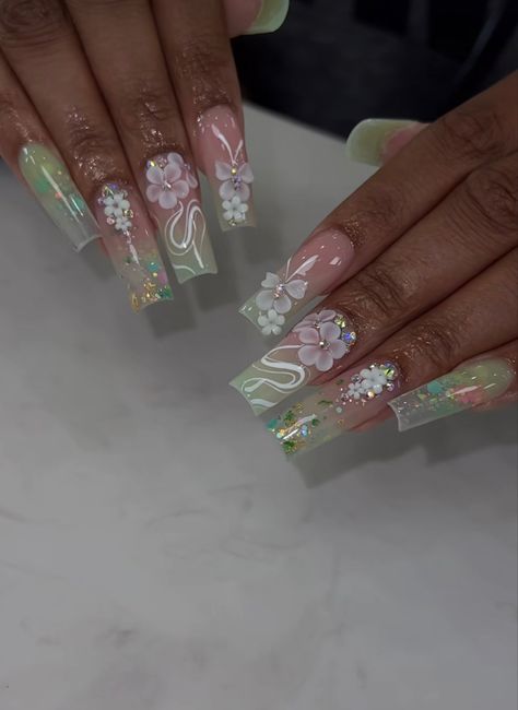 Spring Glam Nails, Unique Almond Acrylic Nails, Lilac Quince Nail Ideas, Pink And Green Acrylic Nails, Spring Bling Nails, Purple Quince Nails Medium, Fairy Tail Nails, Birthday Nails Extra, Butterfly And Flower Nails