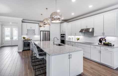 Pulte Homes’ award-winning models showcased during 2021 Lee Parade of Homes Homes Kitchen, Recessed Panel Cabinets, Subway Style, Pulte Homes, Arabesque Tile, Shaker Style Kitchens, Glass Light Fixture, Gathering Room, Kitchen Cabinet Styles