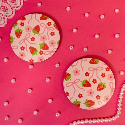 bows and strawberries on light pink coaster Coaster Inspiration, Clay Coaster, Clay Coasters, Unique Candle Scents, Funky Mirrors, Painted Coasters, Planner Writing, Handmade Mirrors, Cute Coasters