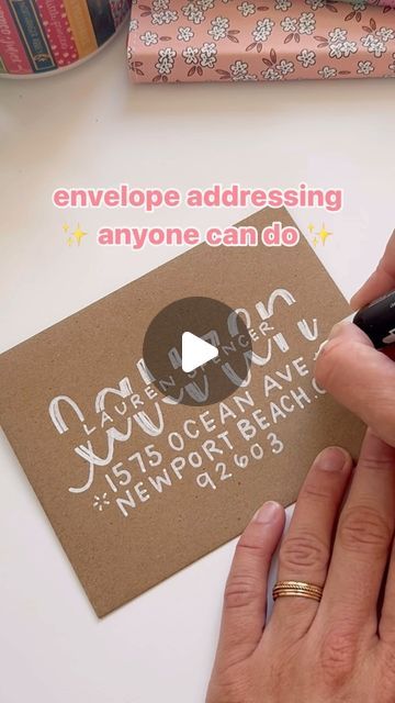 Pippi Post | Bookish Merch ✨ on Instagram: "Save this for the next time you need to address an envelope! ✨

This hack is SO easy and only takes 3 things!

You’ll need:
✨ white marker
✨ washi tape
✨ card + envelope

A few things to remember when you try this:

1. Make sure your washi tape is pressed all the way down so the ink doesn’t bleed through! 

2. Let the ink dry in between so it doesn’t smear 

3. Don’t forget to leave enough room for a stamp at the top! 

Want the links to my favorite supplies and pens? Comment LINK below and I’ll send you the links! ✨

#writelikepippi #envelopeaddressing #envelopeart #handwritingchallenge #envelopechallenge #prettyenvelopes #handwritingideas #pippipost #stationeryaddict" Making Letters Diy Projects, Creative Ways To Address Envelopes, Cool Ways To Address Envelopes, Envelope Addressing Creative, Fun Envelope Addressing, Envelope Addressing Creative Hand Lettering, Calligraphy Envelope Addressing, Washi Tape Cards, Envelope Art