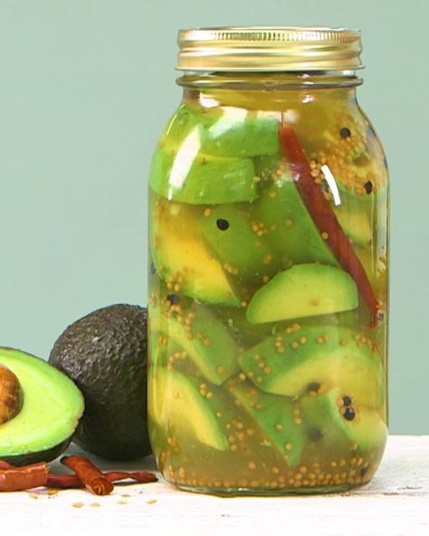 Use avocados that are not quite ripe in this recipe; pickling softens them. Pickled Avocado Recipe, Avocado Pickles, Avocado Snack, Pickle Recipe, Fermentation Recipes, Homemade Pickles, Pickled Veggies, Pickled Vegetables, Avocado Recipes