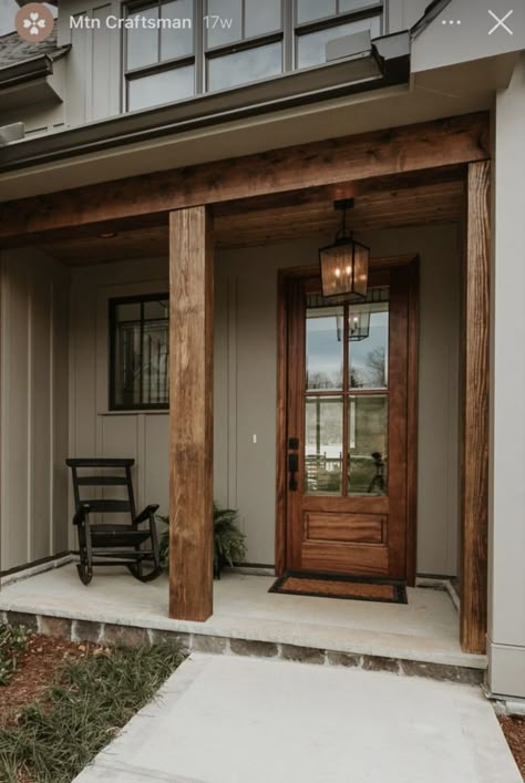 Black Farmhouse With Wood Accents Exterior, Tan Black Exterior House, Dark Gray House Cedar Accents, Exterior Wood Trim On House, Tan House With Wood Accents, Adding Wood Accents To Exterior House, Nature Exterior House Colors, Color Ideas For House Exterior, Tan Color House Exterior