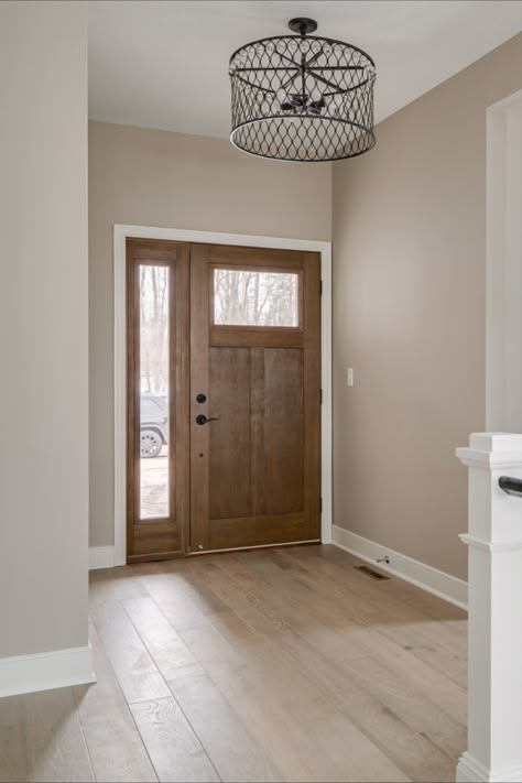 Front Door Not Centered On House, Natural Wood Front Door White House, Bleached Wood Front Door, Wood Tone Front Door, Front Door With Right Sidelight, Wood Front Door Interior, Front Doors With One Side Light, Stained Doors And Trim, Walnut Stained Front Door