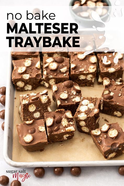 Malteser traybake is actually not baked at all. Also known as Malteser tiffin, this quick and easy, no bake slice is loaded with chocolate and Maltesers and makes the perfect afternoon tea for adults or after school snack for the kids. . With just 7 ingredients and 10 minutes effort, you’ll just need to be patient while it sets in the fridge. This no bake dessert recipe is perfect for bake sales, afternoon tea and parties. You don't need any fancy equipment and even the kids can make this. Malteaser Recipes, Malteser Tray Bake, Malteser Tiffin, No Bake Slice, Malteser Slice, Malteser Cake, Rich Tea Biscuits, Sweet Tooth Craving, Breakfast Cupcakes