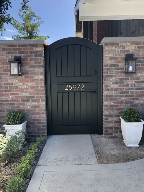 This is a custom dutch entry gate made by Garden Passages.  This clean and stylish courtyard entry features an upgraded body, decorative popouts, and real bronze hardware. Gate Between House And Garage Fence, Front House Gate Ideas, Gates Ideas Entrance, Wood Gates Ideas Entrance, Front Garden Gate, Garden Gate Wood, Side Gate Ideas Backyards Entrance, Side Gates Ideas Modern, Front Door Gate Entrance