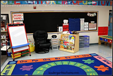 Kindergarten Classroom Reveal Pictures Kindergarten Classroom Setup With Tables, Math Classroom Seating Arrangement, Teacher Read Aloud Chair, Label Tables In Classroom, Classroom Easel, Transitional Kindergarten Classroom, Flexible Seating Expectations, Play Based Learning Kindergarten, Seating Arrangements Classroom Talkative