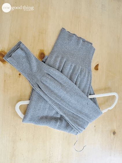 Sweaters On Hangers, Fold Sweaters, How To Fold Sweaters, Sweater Hangers, Hang Sweaters, How To Fold Pants, Organizing Things, Organizing Clothes, Diy Storage Shelves