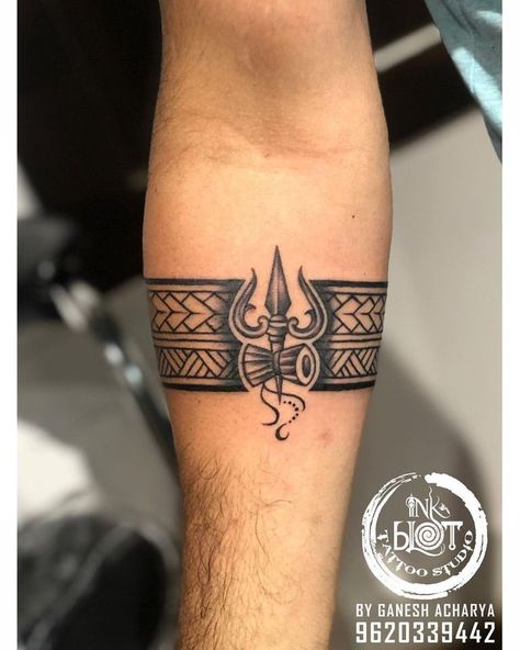 Indian Arm Band Tattoos For Men, Ring Tattoo For Men Arm, Hand Ring Tattoo For Men, Arm Bending Tattoo, Tatoos Men Hand Band, Shiva Tattoo Design For Men Arm, Wrist Band Tattoo Men, Shiv Band Tattoo, Trishul Armband Tattoo