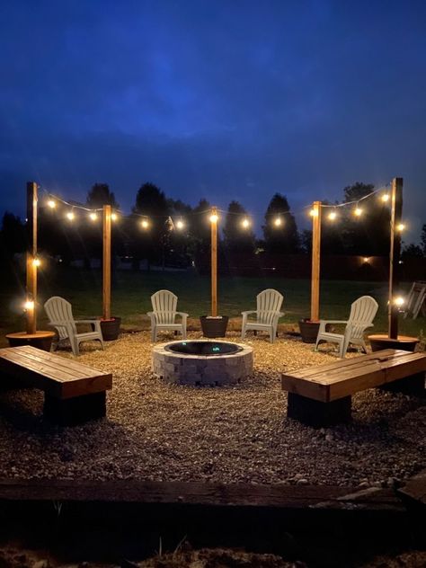 Stone Area In Backyard, Hanging Lights Around Fire Pit, Pool Area Turned Into Fire Pit, Bon Fire Pit Ideas Backyards, Fire Pit With Railroad Ties, Back Yard Fire Pit Area, Backyard Fire Pit Areas, Bonfire Pit Ideas Seating Areas, Ideas For Fire Pit Area