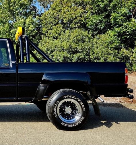 1987 Toyota SR5 XtraCab pickup modified in the style of Marty McFly's truck from the film Back to the Future. Showing 78k miles. It's powered by a 22RE inline-four paired with a five-speed manual transmission and a dual-range transfer case, and it features an aftermarket roll bar, tubular bumpers, covered KC auxiliary lights, and aftermarket 15" wheels. Truck Roll Bar, 1979 Toyota Pickup, 1980 Toyota Pickup, 1987 Toyota Pickup, 1983 Toyota Pickup 4x4, Marty Mcfly, Rolling Bar, Ford 7.3 Powerstroke Diesel Trucks, Transfer Case