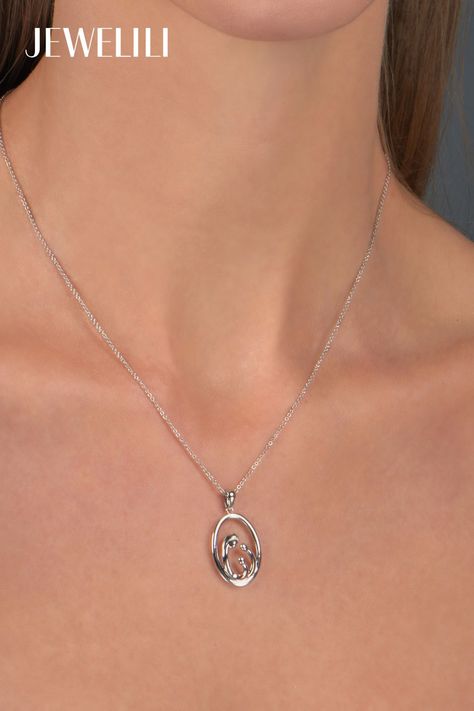 Depicting an unconditional bond between a Mom and Children Pendant, this necklace is a heartfelt gift to Mom for Mother's Day. Made from sterling silver, it captures a Mom and two children in a jolly sway as their arms connect. Whether worn as a daily reminder of the importance of family or on special occasions, this necklace is just perfect. With its timeless style and sentimental value, it symbolizes love, unity, and connection within the family, making it a perfect Mother's Day Gift The Importance Of Family, Necklace Pendent, Gift To Mom, Chain Clothing, Cubic Zirconia Necklace, Kids Necklace, Pendent Necklace, Sterling Silver Necklace Pendants, Rolo Chain