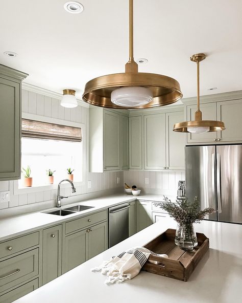 New on the blog: our top 7 green paint colors! If you’re looking for ways to incorporate green into your home or just seeking some Sunday inspiration - go check it out! Link in bio. . On the topic of green…here’s a Sneak Peek of this gorgeous Tangletown kitchen remodel! We’re loving how the soft green cabinetry color is working with the mixed metal finishes. Pairing these gorgeous framed cabinets with a timeless color like Benjamin Moore’s October Mist 1495 was a must. Add a little brass blin... October Mist Kitchen, October Mist Kitchen Cabinets, October Mist, Framed Cabinets, Sunday Inspiration, Framed Cabinet, Green Paint Colors, Kitchen Cabinet Colors, Beautiful Spaces