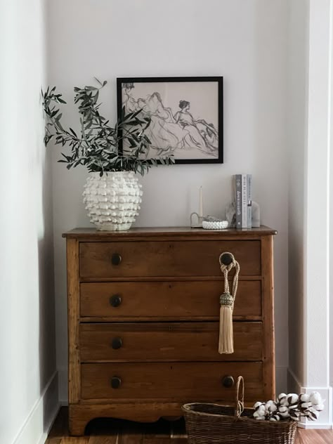 Styled this antique dresser with a mix of new items and vintage finds. And always add greens!! Vintage Wood Dresser Bedroom, Entry Table Dresser, Vintage Dresser Entryway, Antique Furniture Styling, Styling Antique Furniture, Antique Tall Dresser, Short Dresser Bedroom, Antique Dresser Entryway, Antique Wooden Dresser