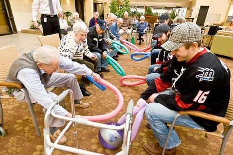 Physical Games For Seniors Nursing Homes, Noodle Hockey, Games For People With Alzheimers, Wheelchair Therapeutic Activity Games, Pool Noodle Hockey For Kids, Activities For Bedridden Seniors, Physio Therapy, Nursing Home Activities, Elderly Activities