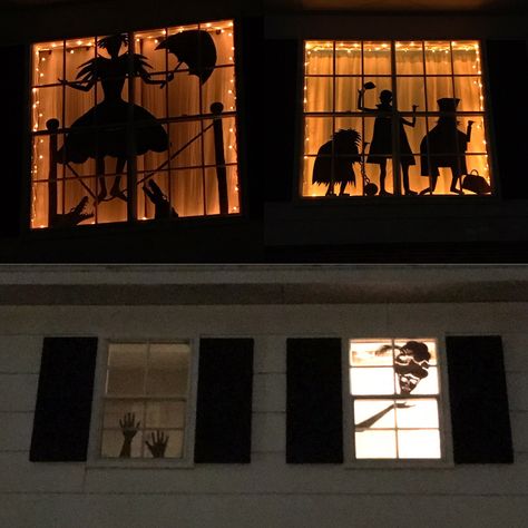 Disney's Haunted Mansion Window Silhouettes for Halloween. Halloween Apartment Window Decorations, Haunted Mansion Exterior Decor, Halloween Decorations Haunted Mansion, Haunted Mansion House Exterior, Haunted Mansion Outside Decor, Haunted Mansion Inspired Decor, Haunted Mansion Front Porch, Haunted Mansion Decor Ideas, Disney Haunted Mansion Halloween Decor