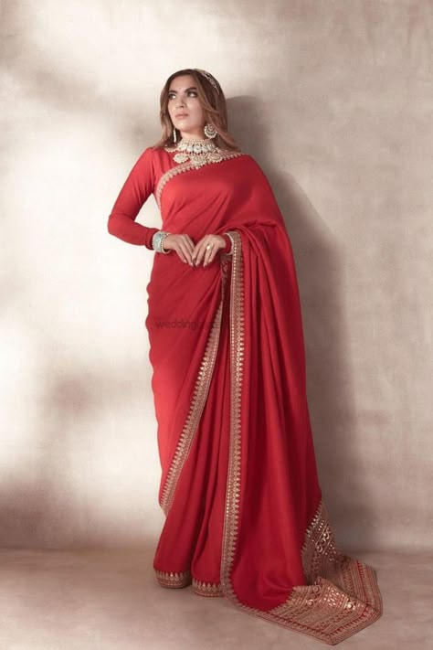 Introducing latest Red Sarees for Weddings & Trousseau .From bridal red saree to plain red saree, we have got amazing designs for all. #weddingbazaar #indianwedding #redsareewedding #redsareelook #redsareeblouse #redsareelookmodern #redsareebridalsouthindian #redsareecontrastblouse #redsareebridalrecepton #redsareeweddingsilk #redsareeplainchiffon #redsareesilk #redsareebanarasi #redsareesabyasachi #redsareekarwachauth #redsareeruffle #redsareeplian #redsareesimple #redsareenet #redsareesequin Bridal Saree Designs, Red Bridal Saree, Sarees For Party, Red Saree Wedding, Red Saree Blouse, Red Sarees, Best Indian Wedding Dresses, Sabyasachi Sarees, Wedding Trousseau