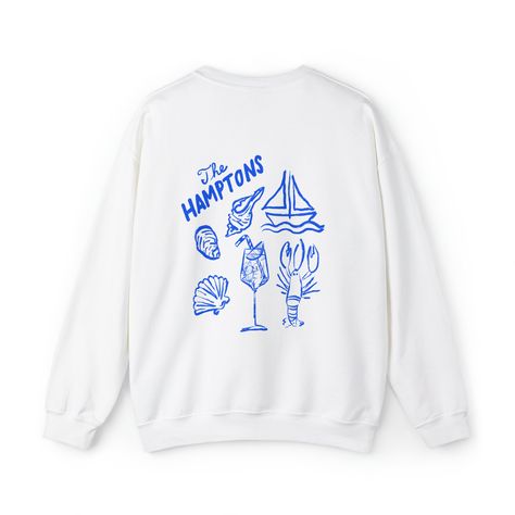 The perfect sweatshirt for a girls trip or your bachelorette in the Hamptons! Perfect for the Montauk Bride! Bride sweatshirt with illustrated with a beach theme- illustrated shells, lobster, aperol spritz, and a sail boat crewneck.  This sweatshirt features a hand-drawn design by illustrator @NounNewYork. Make your bride and bridal party feel extra special. The perfect gift.    Ideal for any situation, a unisex heavy blend crewneck sweatshirt is pure comfort. These garments are made from polyester and cotton. This combination helps designs come out looking fresh and beautiful. The collar is ribbed knit, so it retains its shape even after washing. There are no itchy side seams on these sweaters.  .: 50% cotton, 50% polyester Bachelorette Crew Neck Sweatshirts, Montauk Bachelorette Party, Montauk Bachelorette, Hamptons Bachelorette Party, Bachelorette Sweatshirts, Mexico Bachelorette, Fiesta Shirt, Bride Sweatshirt, Beach Bachelorette