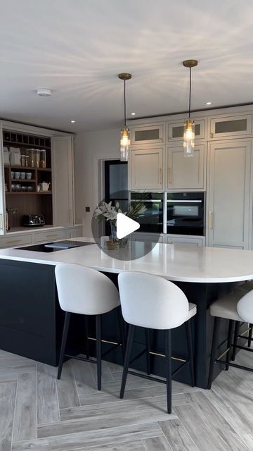 Trevor McDonnell Kitchens on Instagram: "Definitely the kitchen of the weekend 🤍🤍 . . The “ North Galway newbuild project “  . . A really special house in Co Galway. An outstanding outcome.  . . House designed : Corbwell design architects  Kitchen design : TMcD  . A modern take on a classic kitchen. Neutral colour tones with big bright windows and lots of natural light. Open plan living in a well designed room. Neutral colour tones really made the room so calm and relaxing 🤍 . . #tmcd #trevormcdonnellkitchens #newbuild #luxuryhome #luxury #luxuryrealestate #architecture #newbuildhome  #specialproject #irishkitchencompany #luxuryrealestateireland  . .  Open plan living. Neutral interior design. Neutral colour kitchen. Downdraft hob in the island. Eye level ovens. Luxury appliances. Curve Trevor Mcdonnell Kitchens, Neutral Colour Kitchen, Curved Island Kitchen, Kitchen Island With Hob, Large Kitchen Ideas, Architects Kitchen, Interior Design Neutral, Eye Level Ovens, Kitchen Neutral