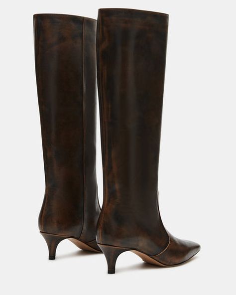 Upgrade your boot game with the LANDER boots. These boots have a square toe, knee-high length, and a trendy kitten heel and elevate any outfit while providing comfort and support. Perfect for everyday wear or dressing up for a night out. 2 inch heel height 14.75 inch shaft circumference 15.25 inch shaft height Leather Trendy Women’s Shoes, Trendy Shoes 2024, Fall Boots 2024, Kitten Heel Boots Outfit, High Boots Aesthetic, Trendy Boots For Women, Brown Heel Boots, Tall Boots Outfit, Leather Boots Outfit