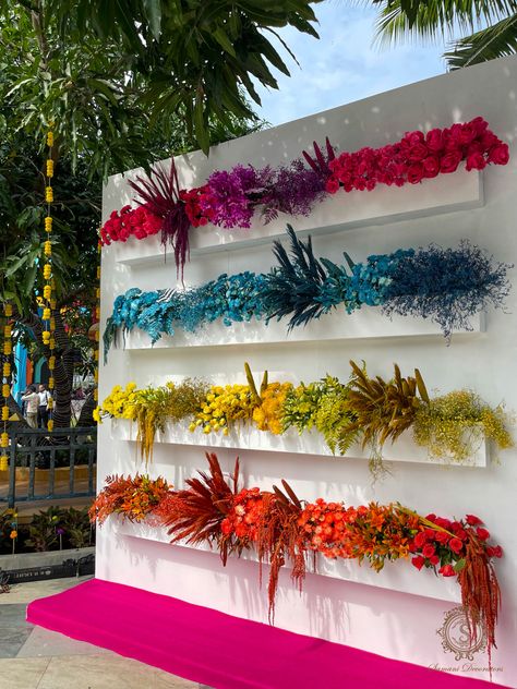 Your wedding deserves to be as colourful as this artwall of flowers. Designed specifically to add the pop of colour you need to enrich your wedding! #weddingdecor #weddingdecorideas #colourfulflowers #flowerembellishments #floralornaments #floralarrangement #samanidecorators #poppfcolour #weddingdecorinspiration #decorinspo #decorideas #weddinginspiration Ambience Decor, Wedding Table Deco, Flower Shop Interiors, Reception Stage Decor, Wedding Background Decoration, Valentine Images, Paper Flower Decor, Flower Installation, Rose Of Sharon