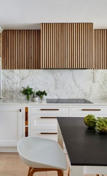 Fresh Kitchen Inspo Modern Fluted Kitchen Cabinets, Slatted Kitchen Island, Wood Slat Range Hood, Wood Slat Ceiling Kitchen, Wood Slat Backsplash Kitchen, Slat Backsplash, Wood Slat Kitchen, Kitchen Hood Ideas Modern, Kitchen Range Hood Ideas