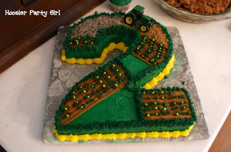 John Deere farm tractor birthday cake.  Love it!! got to find someone that can do this for number 4.  I'm sure he'll still be into tractors and farming. Birthday Cake Boys, Tractor Birthday Cakes, John Deere Cake, John Deere Birthday Party, John Deere Birthday, Deer Farm, Tractor Cake, Tractor Birthday Party, Tractor Party