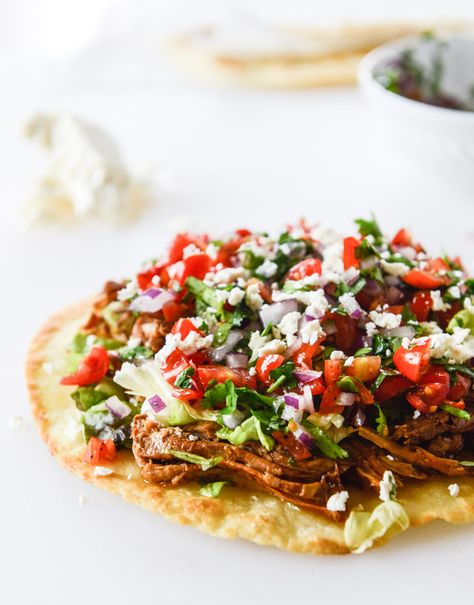 pulled pork tostadas I howsweeteats.com Pulled Pork Tostadas, Pork Tostadas, Tostada Recipes, New Year's Food, Pulled Pork Recipes, Pizza Delivery, Latin Food, How Sweet Eats, Mexican Dishes