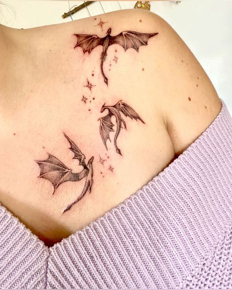 #CoolTattoos #TattooArt #InkMaster #TattooDesigns #InkedUp #TattooLovers #InkInspiration #TattooIdeas #CreativeInk #TattooStyle Magical Dragon Tattoo, Small Cute Dragon Tattoo, The Thirteen Tattoo Tog, Dragon Feminine Tattoo, Throne Of Glass Wyvern Tattoo, The Fourth Wing Tattoo, Books And Dragons Tattoo, Dark Whimsical Tattoo, Manon Tattoos