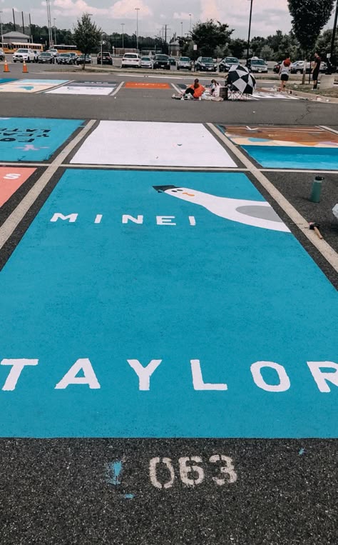 Senior Parking Spot Painting Ideas For Guys, Fun Parking Spot Ideas, Book Themed Senior Parking Spot, Blue Senior Parking Spot, Funny Parking Spots, Funny Painted Parking Spots, Cute Simple Senior Parking Spot Ideas, Funny Parking Spot Painting, Disney Parking Spot