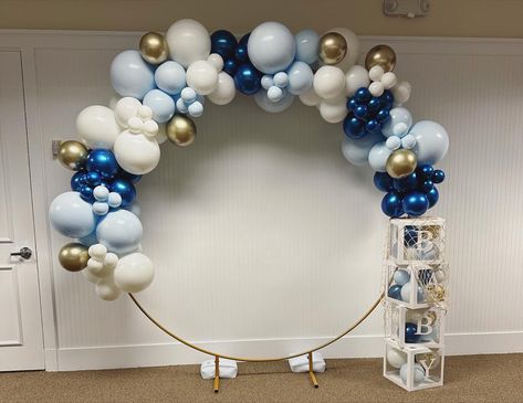 Gold Hoop backdrop with blue, white, gold and metallic blue balloon decor. Baby blocks with balloons inside for a nautical baby boy shower Baby Shower Balloon Decor, Balloon Circle, Hoop Backdrop, Baby Shower Ballons, Nautical Baby Shower, Nautical Baby, Baby Shower Decor, Balloon Decor, Baby Blocks