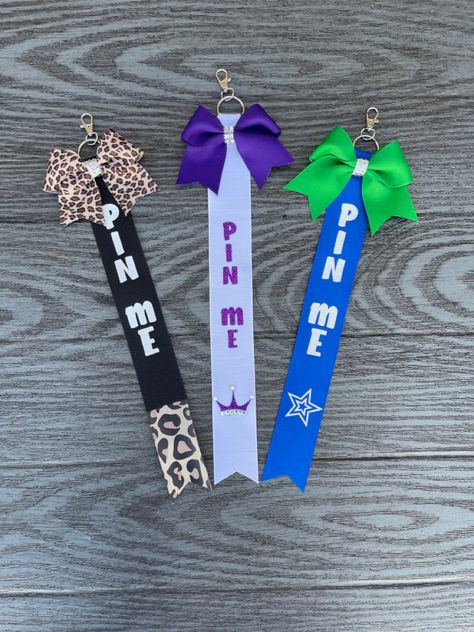 Clothes Pins For Cheer, Cheer Team Mom Gift Ideas, Cheer Pin Holder, Cheer Clothes Pins Ideas, Summit Cheer Gifts For Team, Cheer Pin Me Ribbon Diy, Cheer Zipper Pull Diy, Pin Me Cheer Ribbon Diy, Cheer Pins For Backpacks Ideas