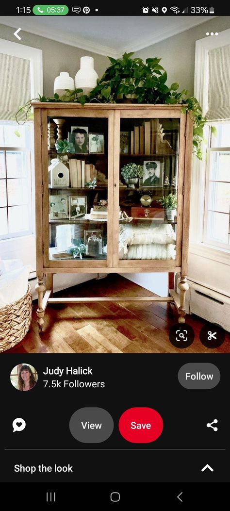 Decorating Armoire Tops, Green Modern Farmhouse Living Room, Vintage Two Door Cabinet, Decorating Top Of Buffet Cabinet, Display Case Makeover, Boho China Cabinet Display, Top Of Armoire Decor, Glass Cabinet Decor, Vintage China Cabinet