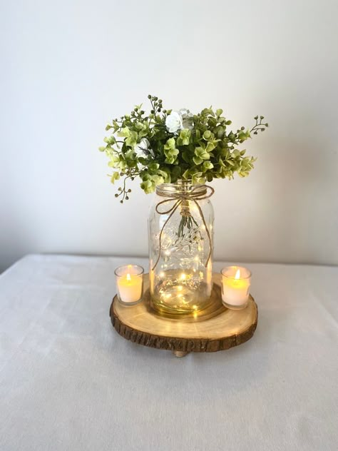 Mason Jars With Lights, Jar Centerpiece Wedding, Event Table Decor, Mason Jar Fairy Lights, Gallon Mason Jars, Light Flowers, Mason Jar Centerpiece, Lighted Centerpieces, Green Centerpieces