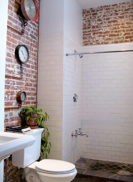 cool bathroom!!! Brick Bathroom Wall, Exposed Brick Bathroom, Brick Bathroom, Rustic Bathroom Lighting, Basement Bathroom Design, Basement Bathroom Remodeling, Rustic Ceiling Lights, Subway Tiles Bathroom, Rustic Loft