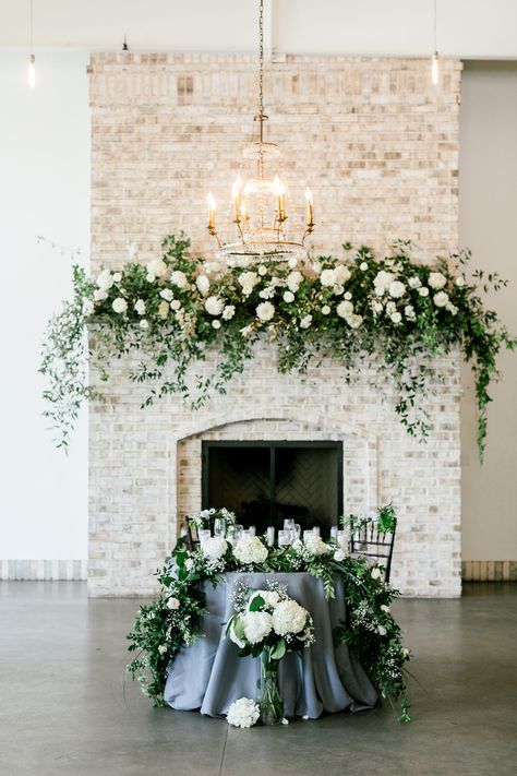 Viva L'Event is an Event Planning & Design based in North Carolina. #brideandgroomtable #weddingdecor #weddingreception Mantel Floral Arrangements, Wedding Fireplace Decorations, Mantel Flowers, Wedding Mantle, Wrightsville Manor, Wedding Fireplace, Fireplace Decorations, Best Wedding Planner, Floral Arrangements Wedding