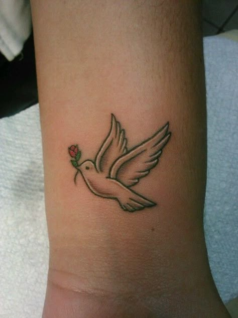 Got this tattoo! My first and I love it! Dove Tattoo Meaning, Peace Dove Tattoos, Small Dove Tattoos, Dove Tattoo Design, Peace Tattoos, Dove Tattoos, Arrow Tattoo Design, Cross Tattoos For Women, Dove Tattoo