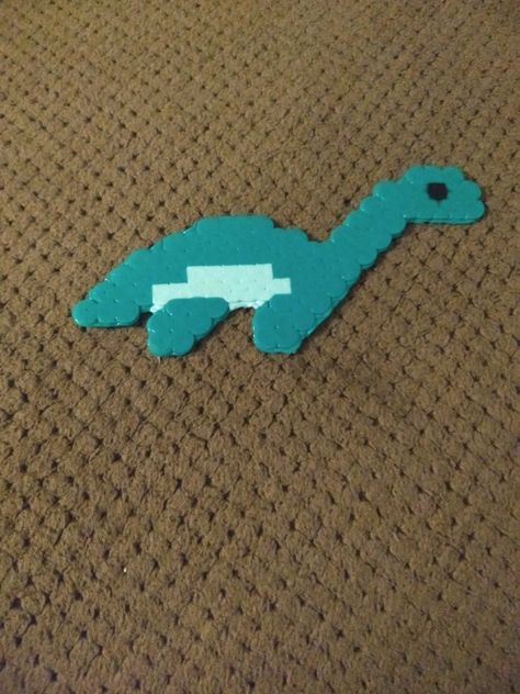 Perler Bead Plesiosaurus Dinosaur Peeler Bead Dinosaur, Perler Bead Pins, Perler Bead Dinosaur, Dinosaur Perler Beads, Dinosaur Stuff, Celtic Crafts, Easy Perler Bead Patterns, Pokemon Perler Beads, Lost Lands