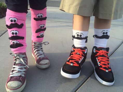 Silly sock day! Some mustaches and printed eyeballs. Would be even funnier with googlie eyes. Super easy using a glue gun and mustaches we found at the 99 cent store. Crazy School Day, Crazy Socks For Kids, Spirit Day Ideas, Wacky Socks, Wednesday Outfit, School Spirit Days, 99 Cent Store, Wacky Wednesday, Silly Socks