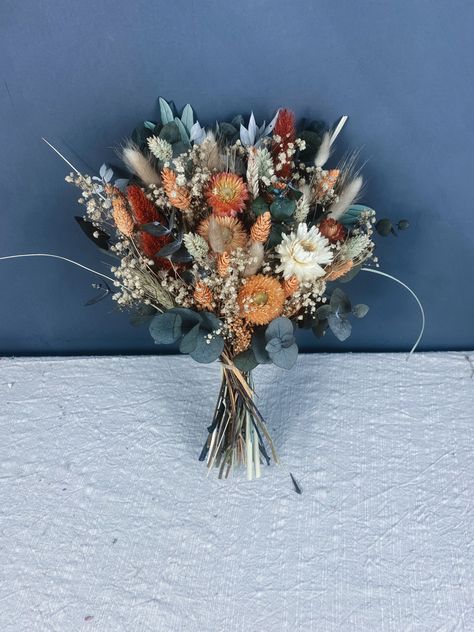 A stunning dried wedding bouquet in oranges, peaches, mustard, greens ans naturals. A beautiful dried bridal bouquet you can treasure for years. Take a look at our bespoke dried wedding flowers now Wedding Flowers Autumn, Dried Flower Bridesmaid Bouquet, Dried Wedding Bouquet Ideas, Dried Wedding Bouquet, Dried Bridal Bouquet, Bouquet Craft, Dried Flower Bouquet Wedding, Dried Wedding Flowers, October Wedding Flowers