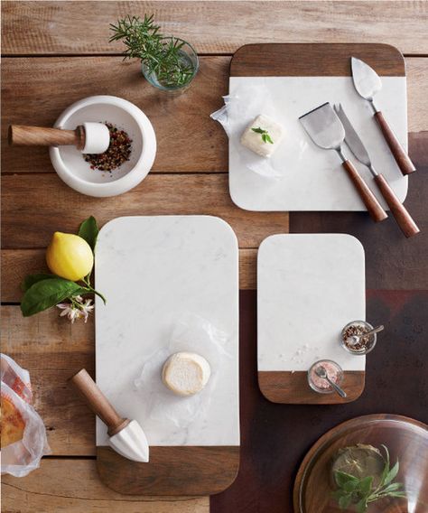 Elegant rounded corners and beveled edges distinguish this collection of modern white marble and sheesham wood table accessories.  Square shaped marble cheese b Marble Cheese Board, Ordinary Objects, Marble Accessories, Marble Square, Marble Board, Marble Collection, Wood Cheese Board, Cheese Knife Set, Marble Wood