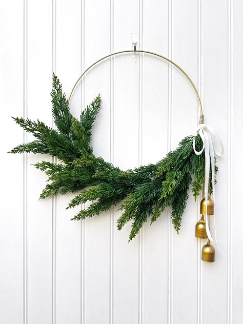 Metal Hoop Christmas Wreath, Christmas Wreath Minimalist, Wreath On Mirror, Minimalist Christmas Wreath, New Years Wreath, Wreath With Bells, Modern Christmas Wreath, Metal Wreath Ring, Winter Wreath For Front Door