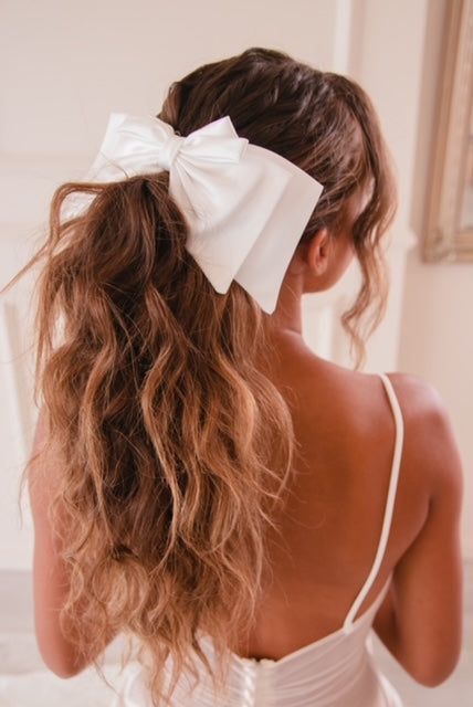 Wedding Ponytail With Bow, Wedding Hair With Bow Ribbons, Wedding Hair Updo With Bow, Low Bun Wedding Hair With Bow, Wedding Hairstyles With Bow Veil, Bridal Hair With Ribbon, Bow Bridal Hair, Bride Hairstyles With Bow, Bridal Bow Hair