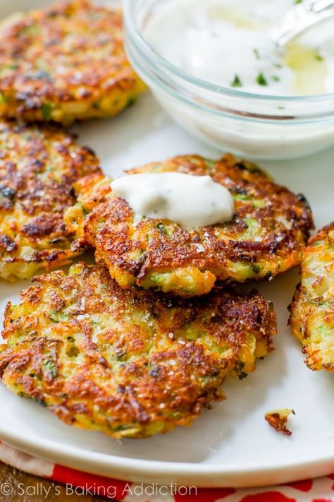 Herb Yogurt Sauce, Garlic Herb Sauce, Zucchini Fritters Recipe, Sweet Potato Fritters, Potato Fritters, Sally's Baking, Herb Sauce, Zucchini Fritters, Zucchini Bread Recipes