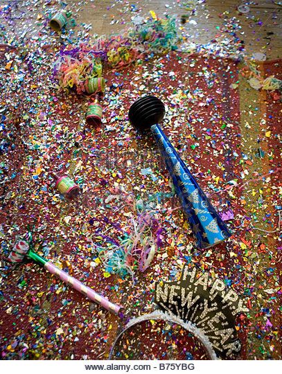 New Years Eve Party Wreckage including confetti poppers horns streamers and hats - Stock Image Confetti Photography, New Years Confetti, Gold Confetti Aesthetic, Confetti Popper Photoshoot, Throwing Confetti Photography, Blowing Confetti Picture, Nye Confetti, Confetti Poppers, New Year’s Eve